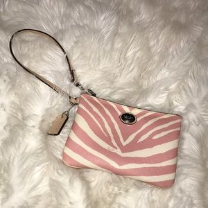 Coach wrist purse. Pink/white zebra design.